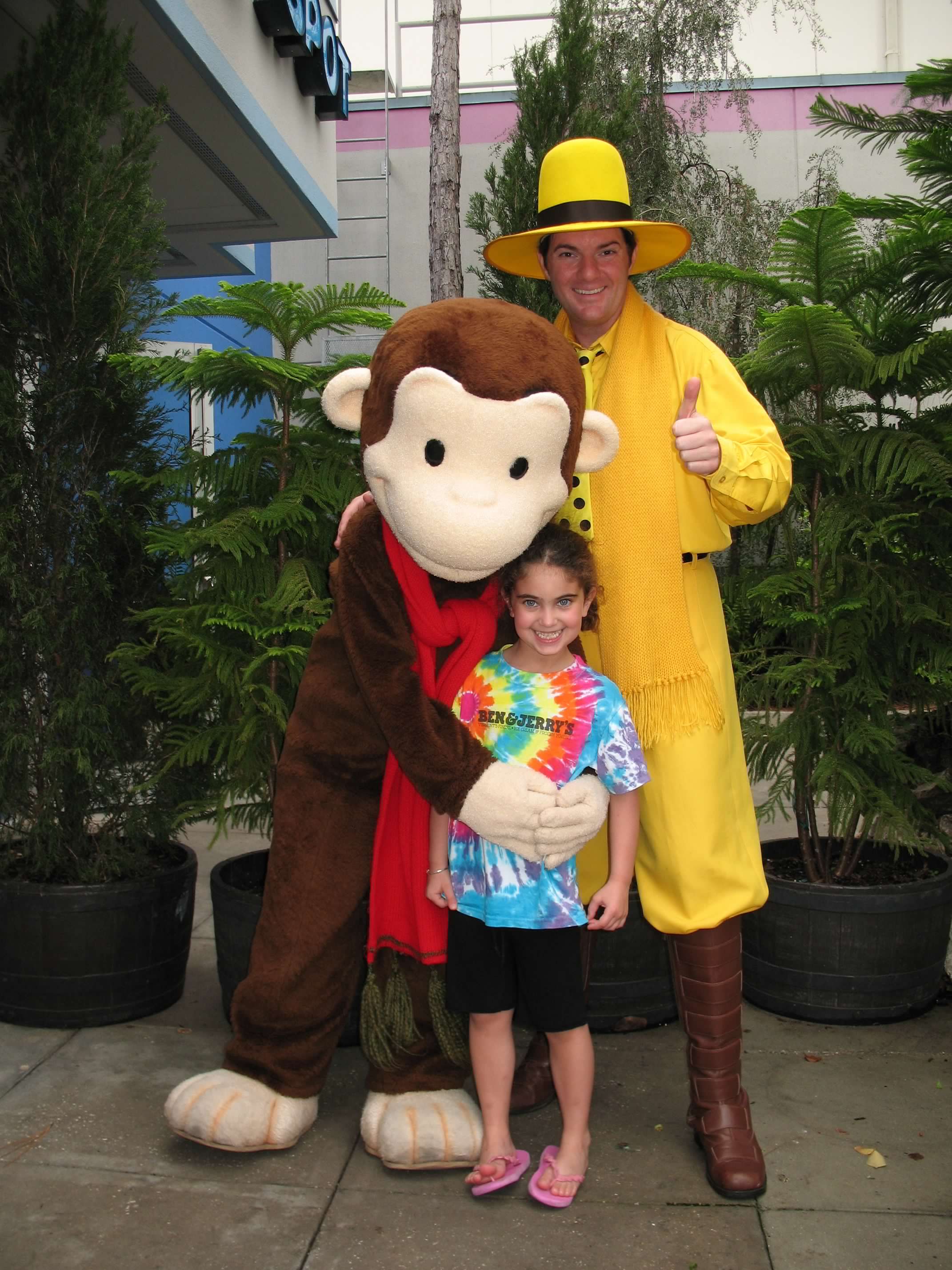 a young perri with curious george